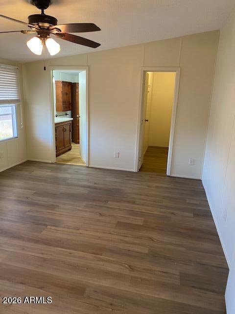 301 South Signal Butte Road, Unit 1124 Apache Junction, AZ 85120 - Photo 19 of 41 a view of empty room with wooden floor