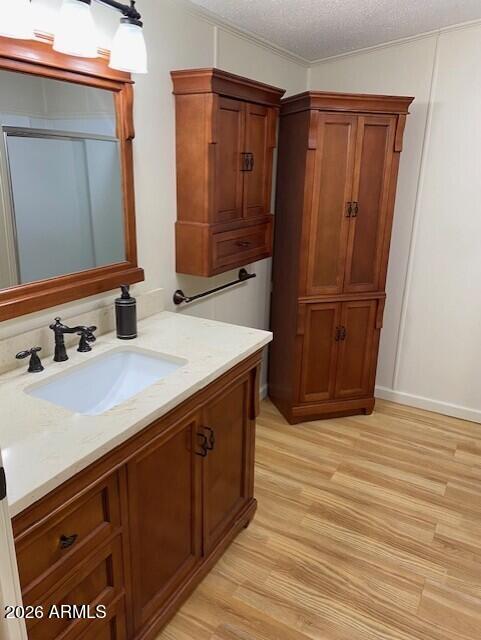 301 South Signal Butte Road, Unit 1124 Apache Junction, AZ 85120 - Photo 21 of 41 a bathroom with a sink and a mirror