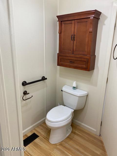 301 South Signal Butte Road, Unit 1124 Apache Junction, AZ 85120 - Photo 23 of 41 a bathroom with a toilet and a shower