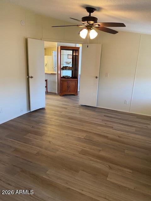 301 South Signal Butte Road, Unit 1124 Apache Junction, AZ 85120 - Photo 25 of 41 wooden floor in an empty room with a window