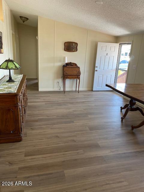 301 South Signal Butte Road, Unit 1124 Apache Junction, AZ 85120 - Photo 7 of 41 a room with wooden floor and window
