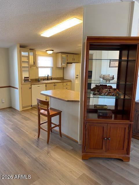 301 South Signal Butte Road, Unit 1124 Apache Junction, AZ 85120 - Photo 8 of 41 a kitchen with stainless steel appliances granite countertop a stove and a refrigerator