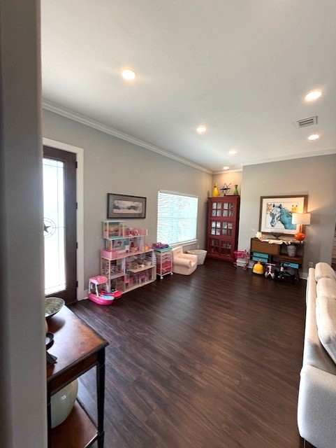 928 Azalea Drive Franklin, TX 77856 - Photo 11 of 37 a view of a room with wooden floor and furniture