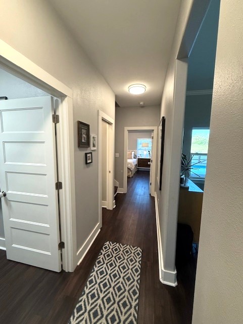 928 Azalea Drive Franklin, TX 77856 - Photo 15 of 37 a view of a hallway with wooden floor and closet