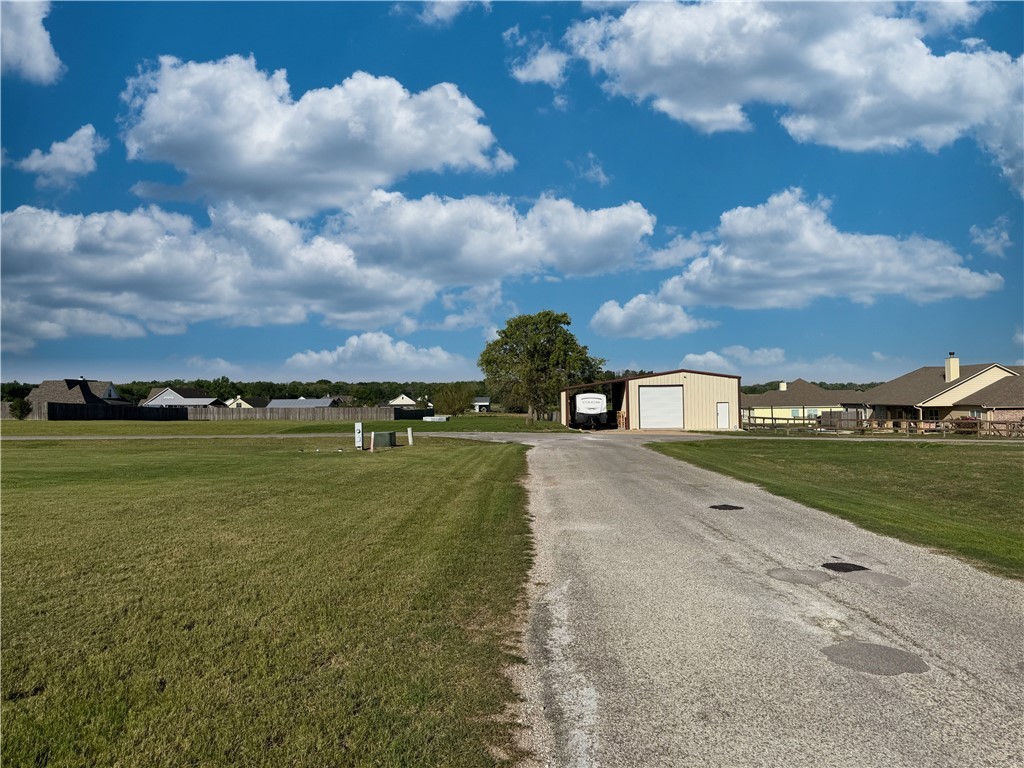 928 Azalea Drive Franklin, TX 77856 - Photo 34 of 37 a view of a town with big yard