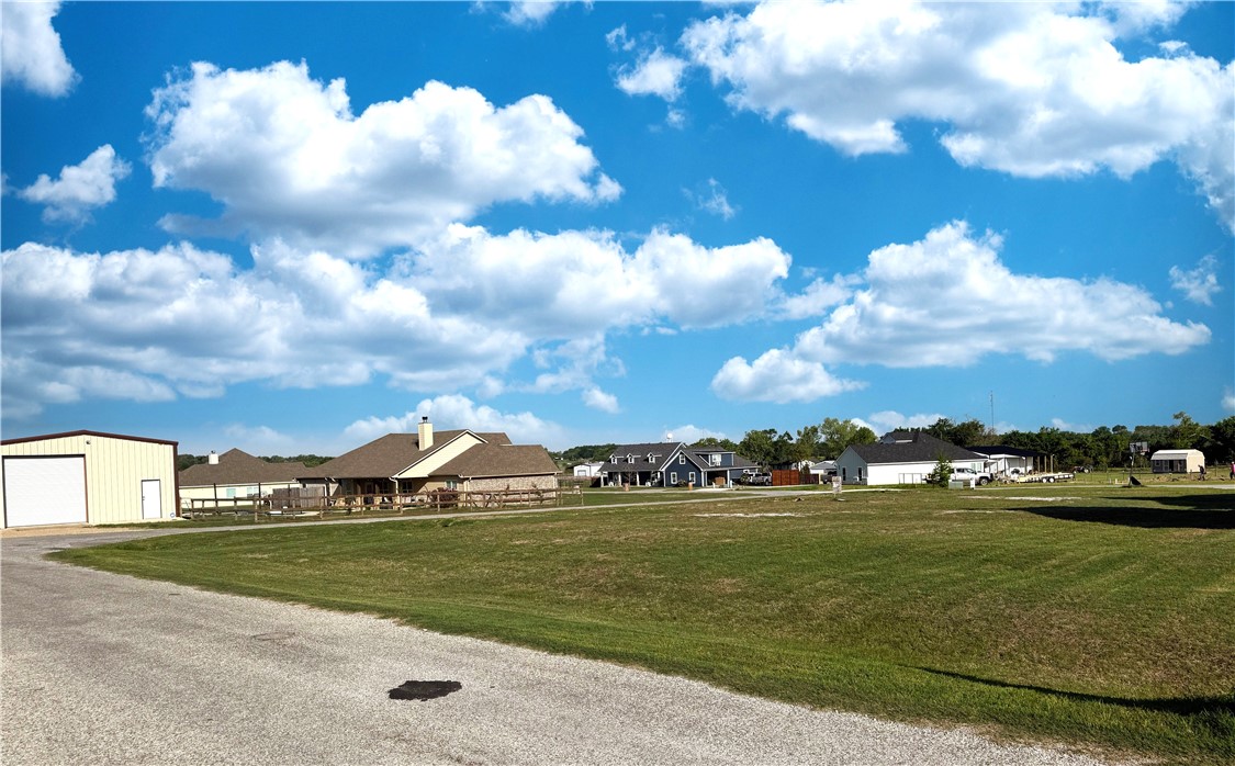 928 Azalea Drive Franklin, TX 77856 - Photo 35 of 37 a view of an ocean with beach
