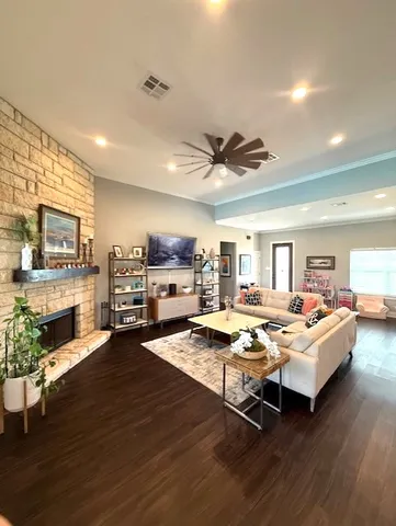 a living room with furniture and a window
