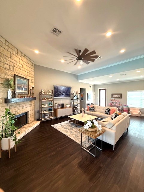 928 Azalea Drive Franklin, TX 77856 - Photo 9 of 37 a living room with fireplace furniture and a wooden floor