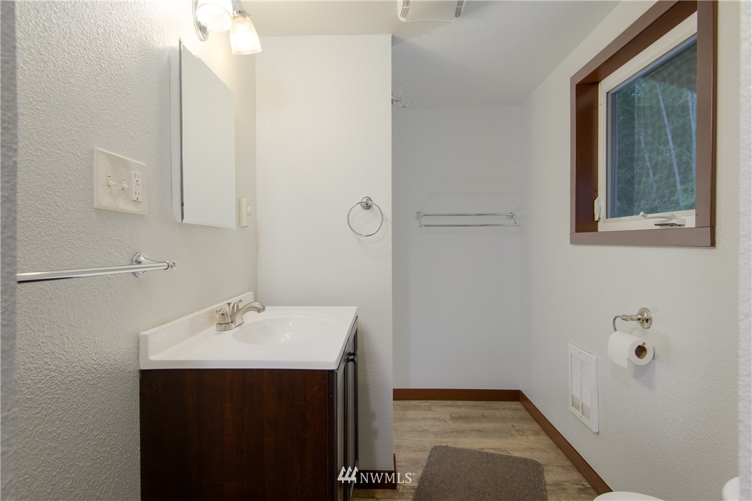 2710 Callow Road Lake Stevens, WA 98258 - Photo 27 of 37 a bathroom with a sink and a mirror