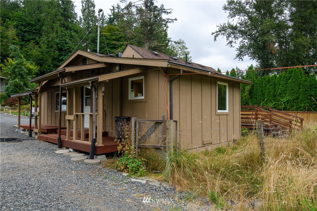 2710 Callow Road Lake Stevens, WA 98258 - Photo 5 of 37 a front view of a house with garden