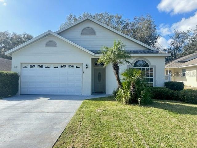 47 Ginger Circle Leesburg, FL 34748 - Photo 1 of 1 a front view of house with yard