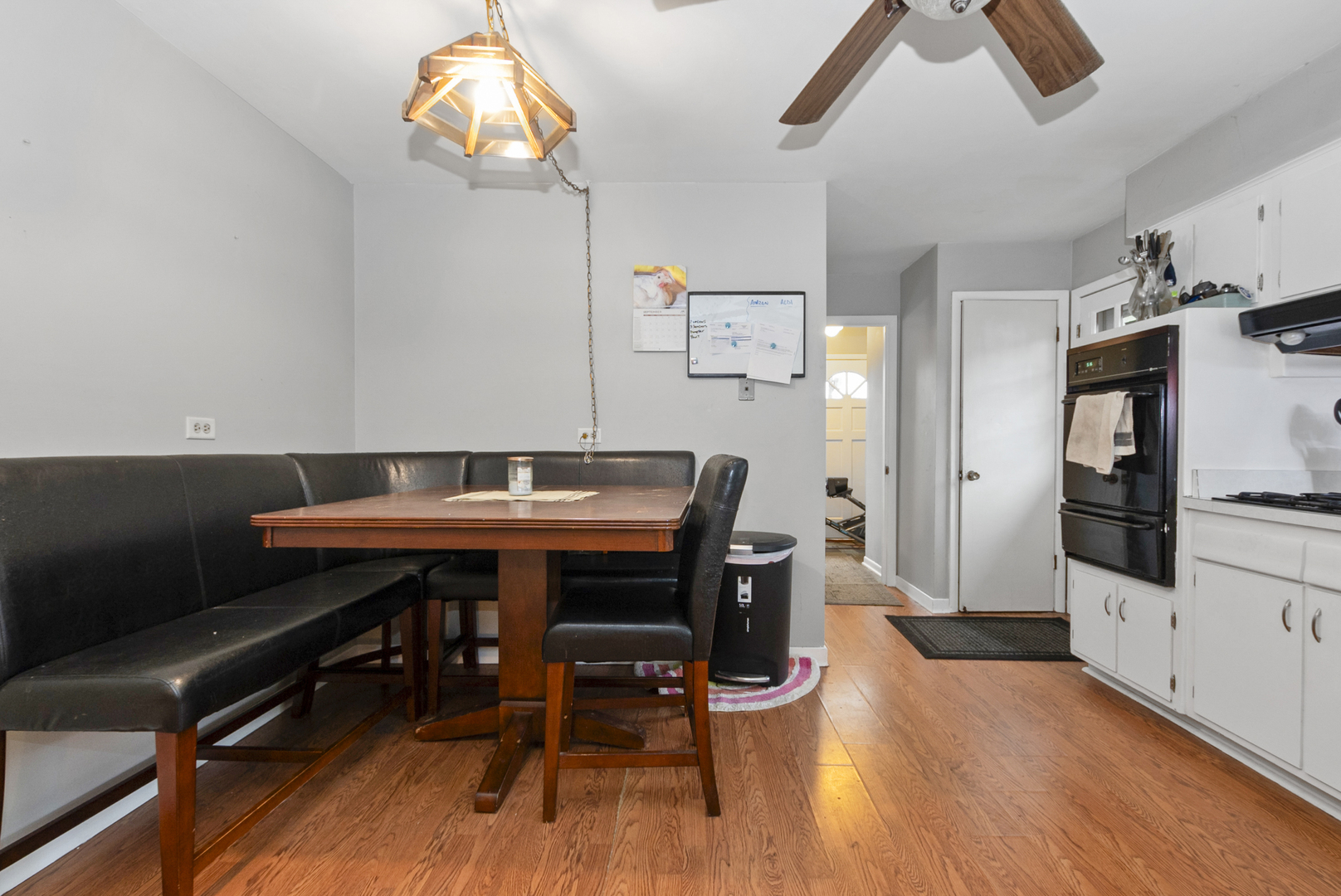 4511 West Howdy Lane Alsip, IL 60803 - Photo 11 of 17 a view of a dining room with furniture and wooden floor