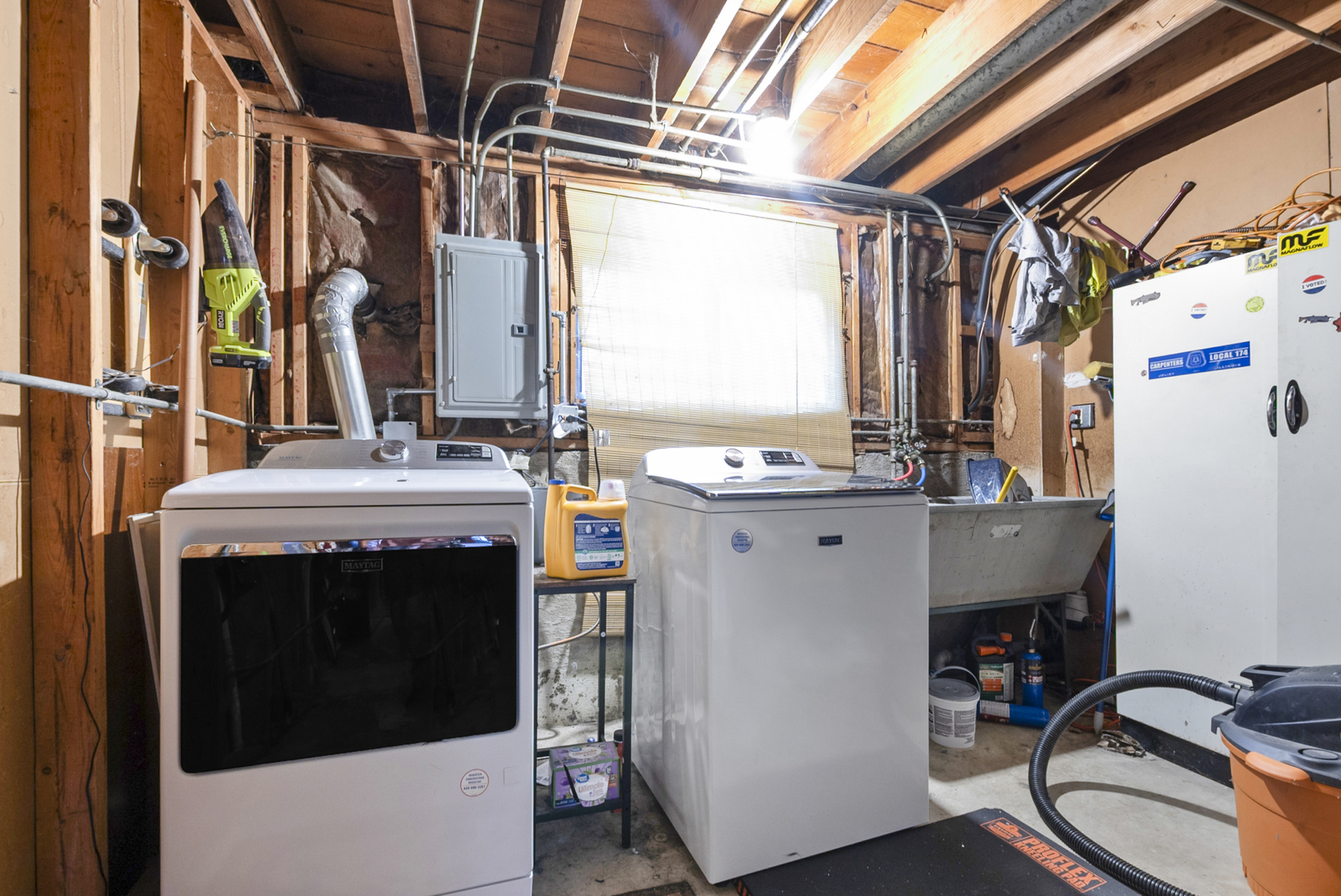 4511 West Howdy Lane Alsip, IL 60803 - Photo 17 of 17 a view of washer and dryer with bathroom in the background