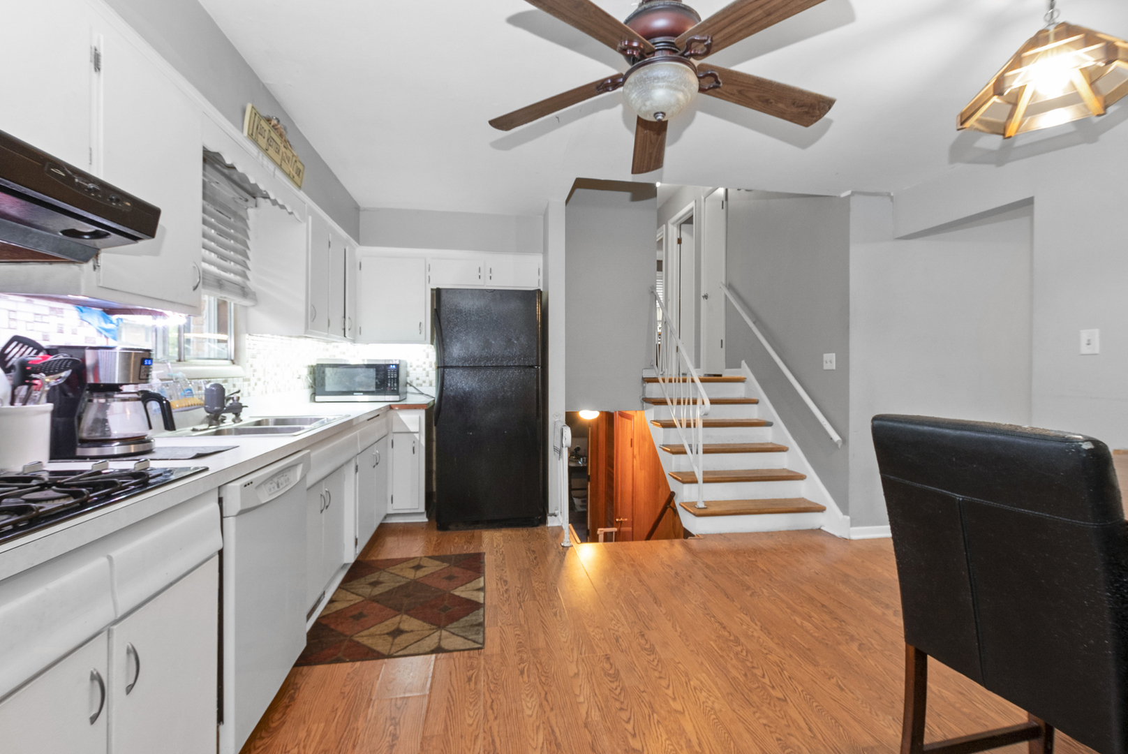 4511 West Howdy Lane Alsip, IL 60803 - Photo 9 of 17 a kitchen with stainless steel appliances a refrigerator and a stove