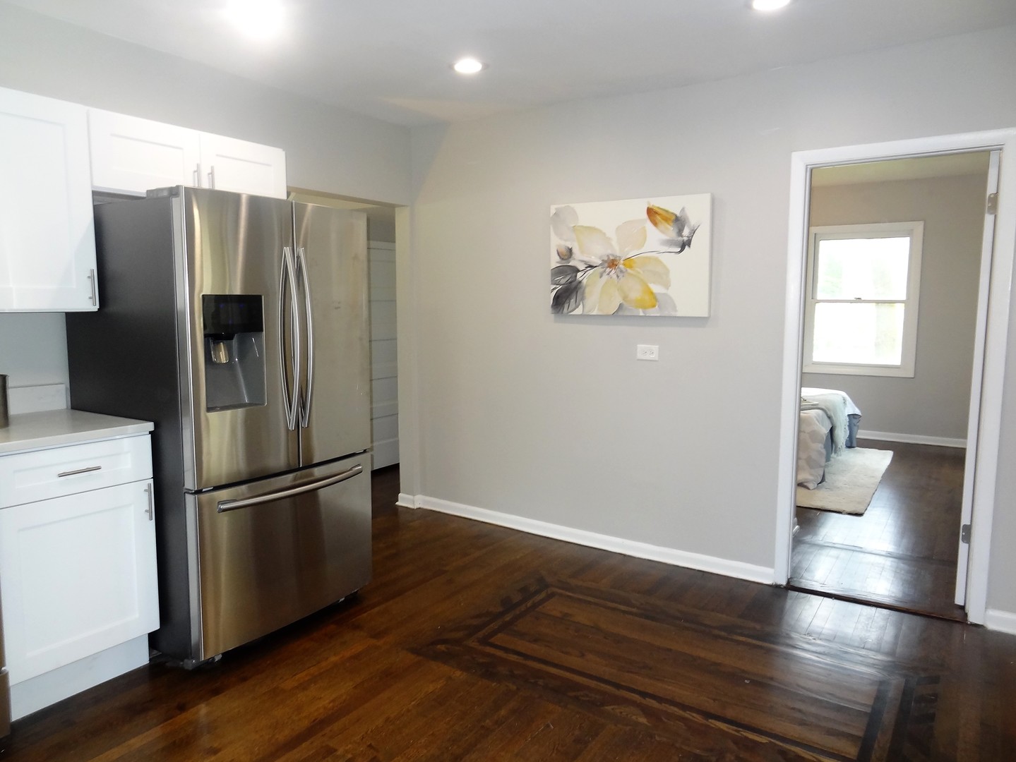 3331 Flossmoor Road Flossmoor, IL 60422 - Photo 23 of 29 a metallic refrigerator freezer sitting in a kitchen