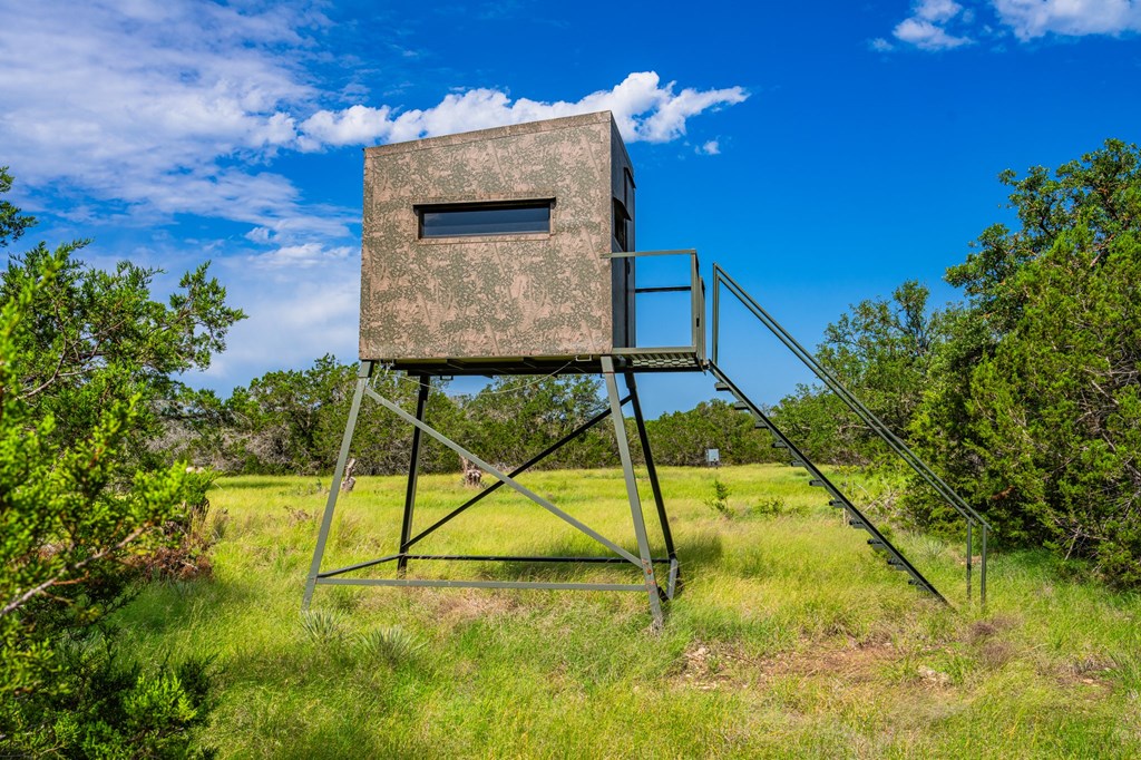 229 Lost Man Road Northwest Junction, TX 76849 - Photo 2 of 32 a view of swimming pool