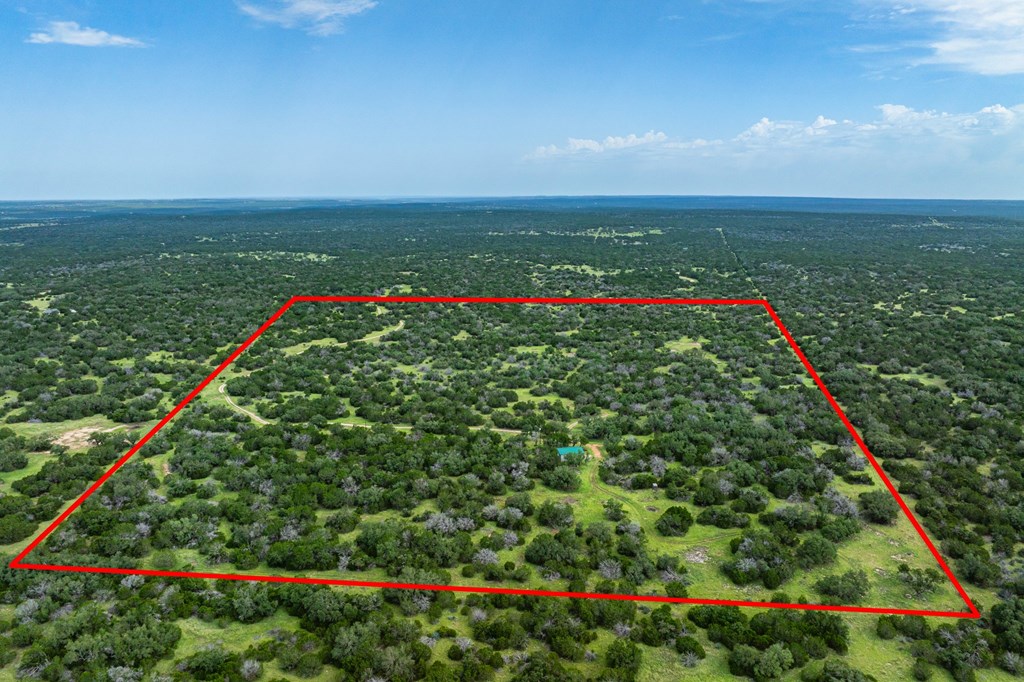 229 Lost Man Road Northwest Junction, TX 76849 - Photo 25 of 32 a view of a lush green field