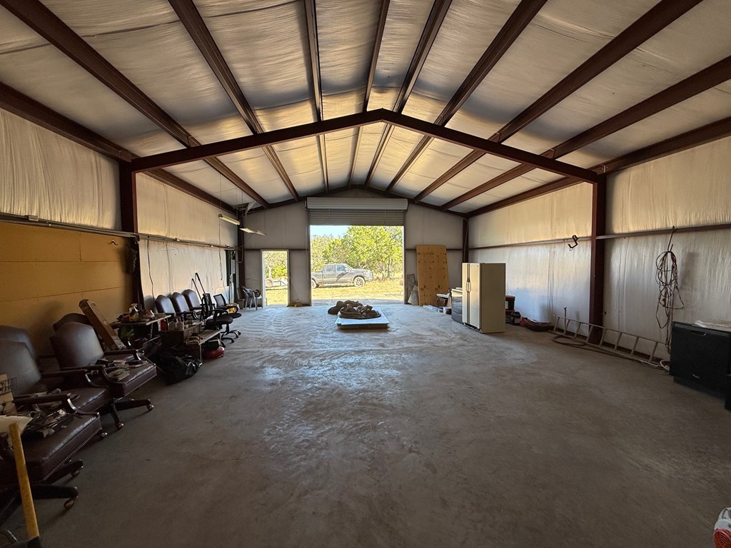 229 Lost Man Road Northwest Junction, TX 76849 - Photo 4 of 32 a view of a room with gym equipment