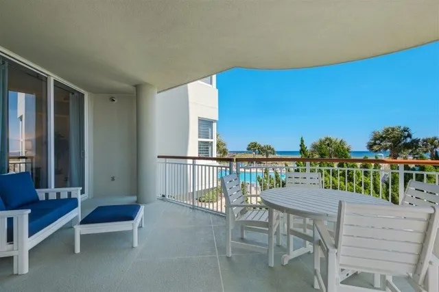 a view of balcony with furniture
