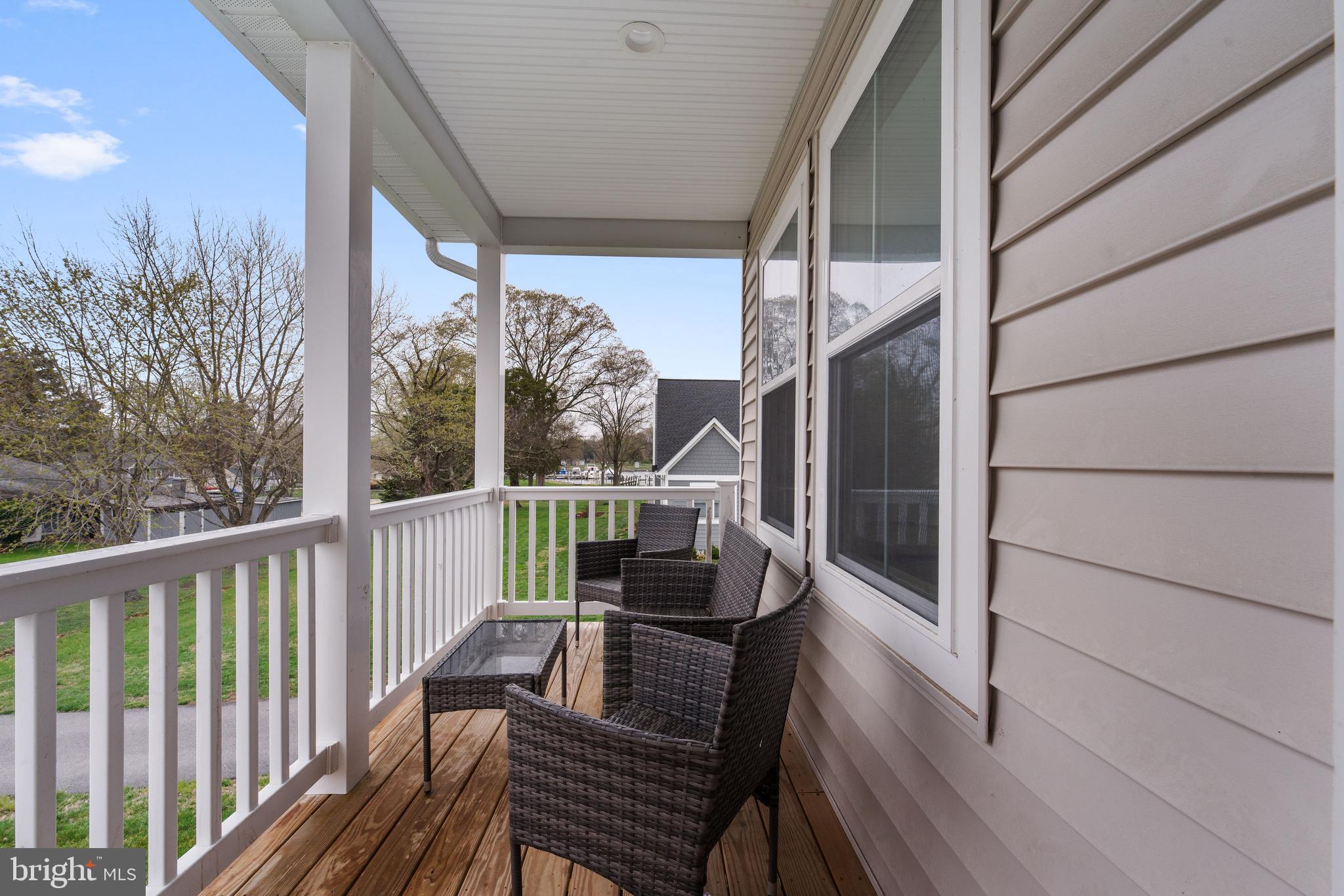 620 Doyle Road Deale, MD 20751 - Photo 11 of 36 Front covered balcony off living room - serene!