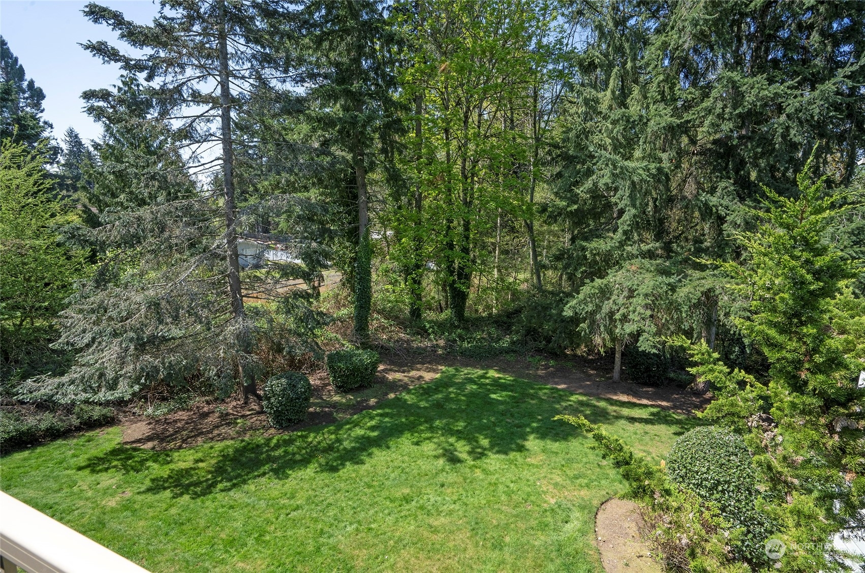14401 Southeast Petrovitsky Road, Unit E205 Renton, WA 98058 - Photo 25 of 28 a view of outdoor space and garden