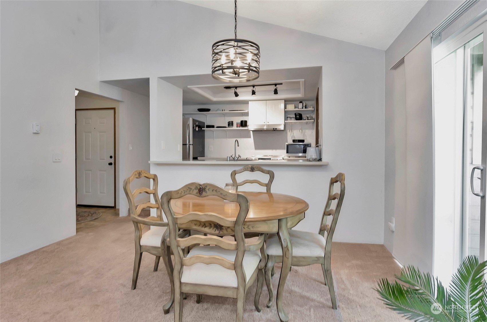 14401 Southeast Petrovitsky Road, Unit E205 Renton, WA 98058 - Photo 8 of 28 a dining room with furniture and window