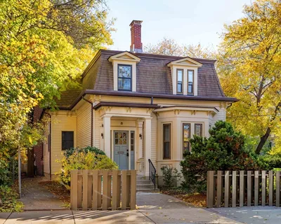 front view of a house with a yard