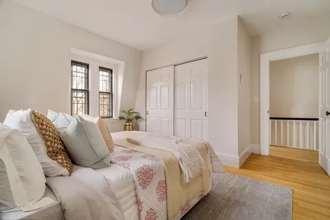 a room that has a window in it and a sink