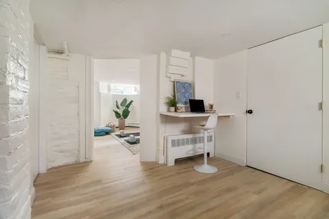 a view of a room with washer and dryer