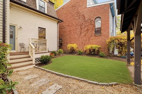 a view of a chairs on the roof deck