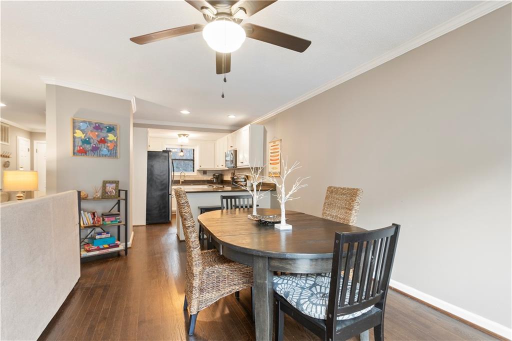 641 Riverside Drive Ellijay, GA 30540 - Photo 12 of 42 a view of a dining room with furniture and wooden floor