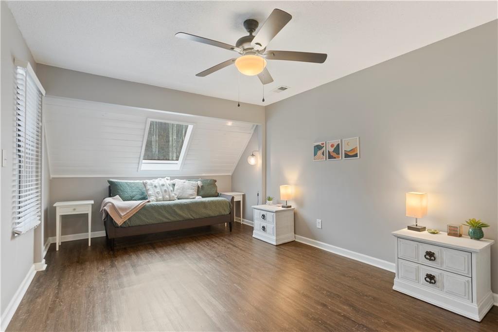641 Riverside Drive Ellijay, GA 30540 - Photo 21 of 42 a living room with furniture and a chandelier