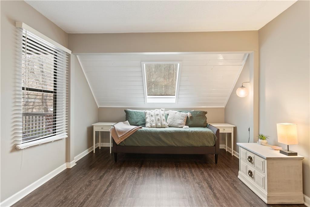 641 Riverside Drive Ellijay, GA 30540 - Photo 23 of 42 a bedroom with a bed and a window