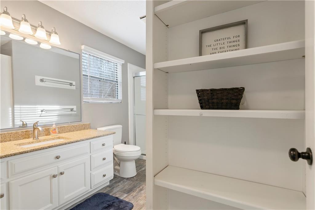 641 Riverside Drive Ellijay, GA 30540 - Photo 28 of 42 a bathroom with a sink and a mirror