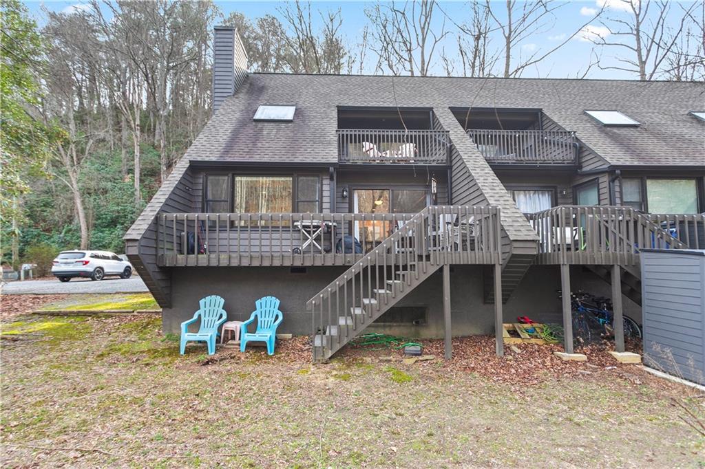 641 Riverside Drive Ellijay, GA 30540 - Photo 36 of 42 a view of house with swimming pool and sitting area