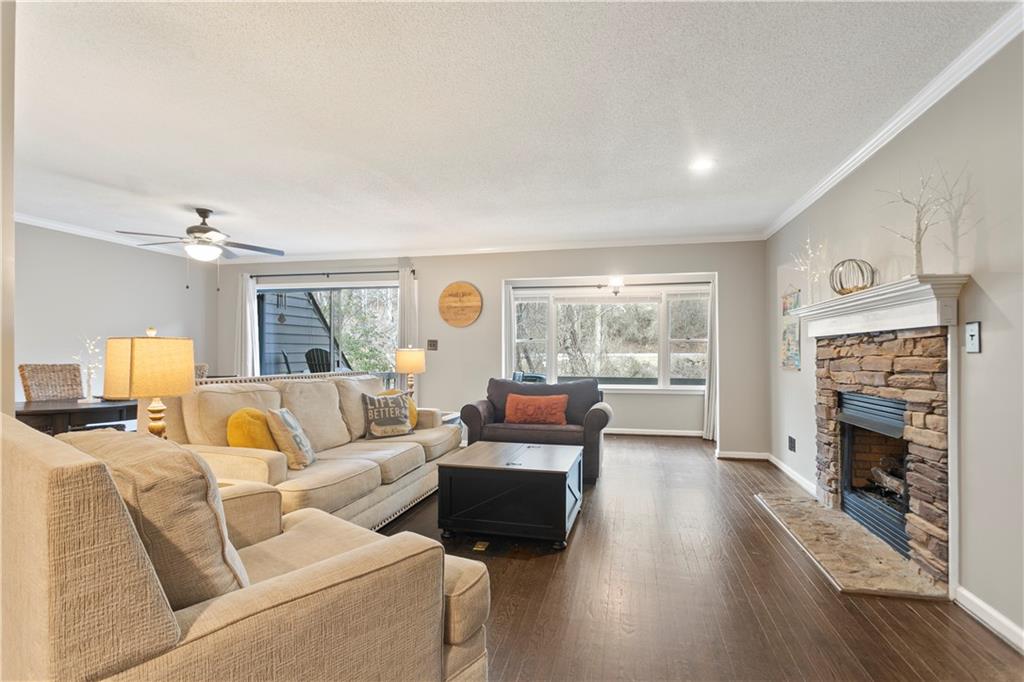 641 Riverside Drive Ellijay, GA 30540 - Photo 8 of 42 a living room with furniture and a fireplace