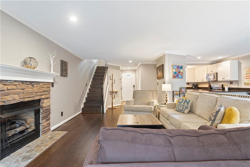 641 Riverside Drive Ellijay, GA 30540 - Photo 9 of 42 a living room with furniture and a fireplace