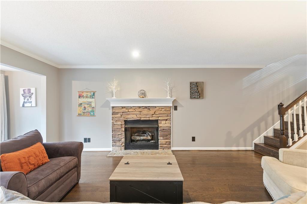641 Riverside Drive Ellijay, GA 30540 - Photo 10 of 42 a living room with furniture and a fireplace