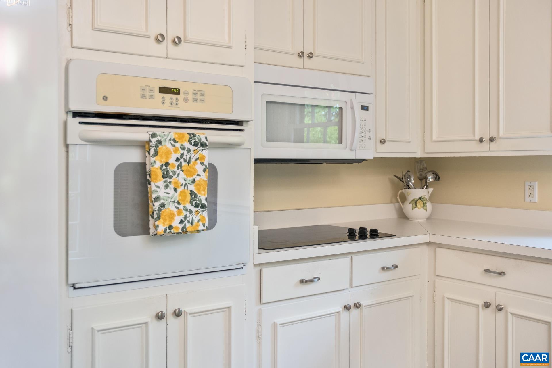 2509 Northfield Road Charlottesville, VA 22901 - Photo 12 of 44 a kitchen with stainless steel appliances white cabinets and a sink