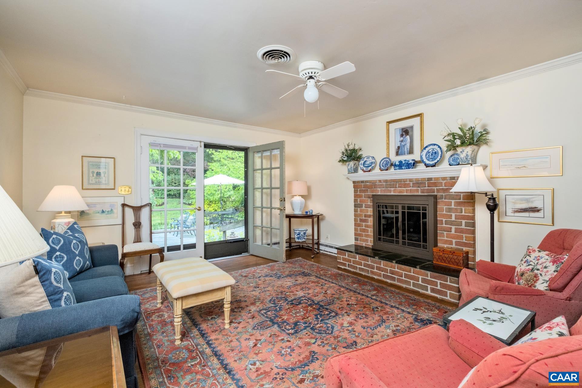 2509 Northfield Road Charlottesville, VA 22901 - Photo 14 of 44 a living room with furniture and a fireplace