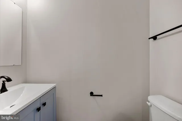 a bathroom with a sink and a vanity