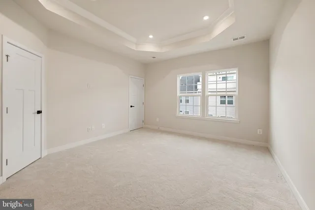 a view of a balcony with wooden floor