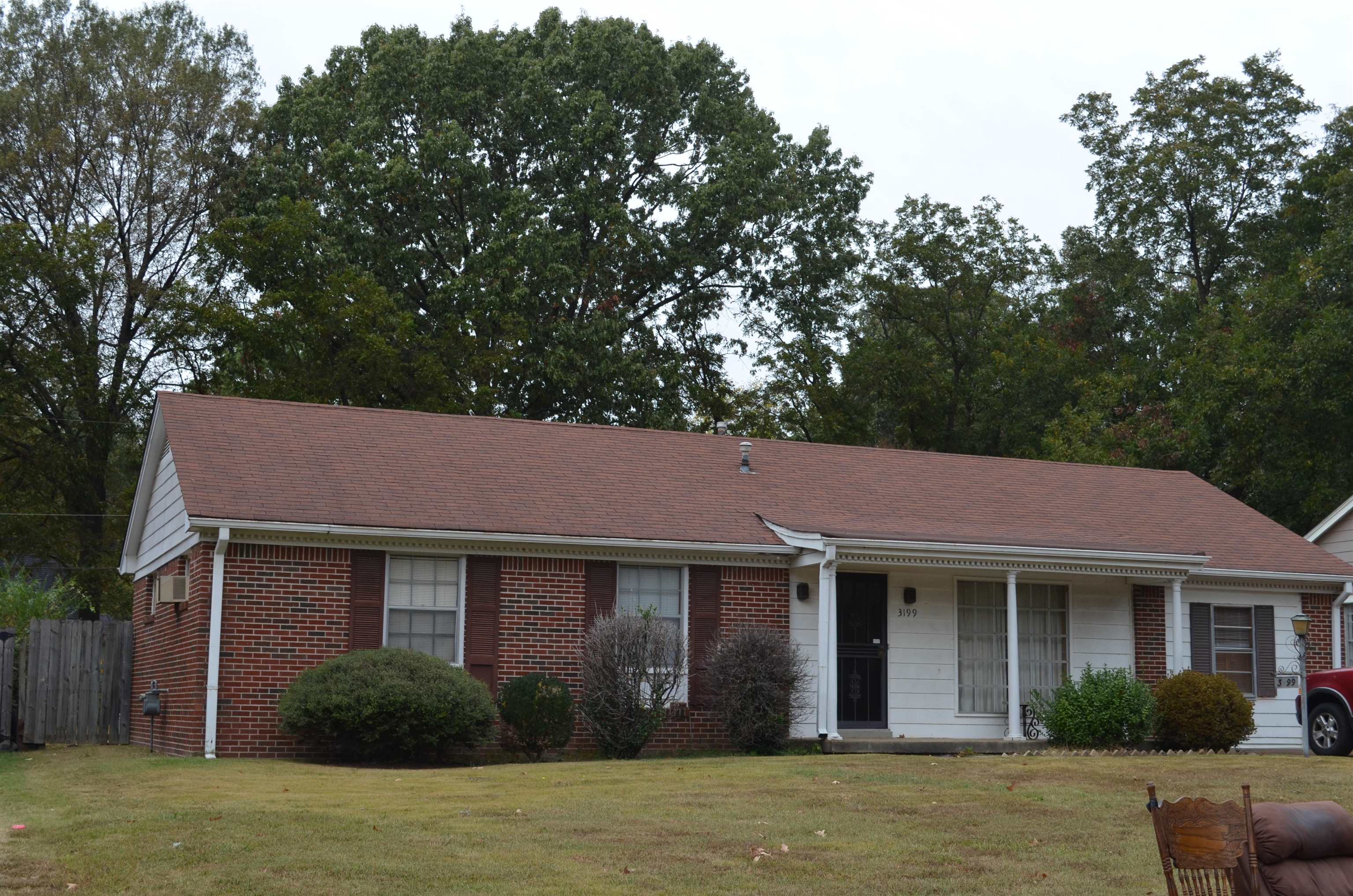 3199 Craig Street Memphis, TN 38118 - Photo 1 of 1 a front view of a house with a garden
