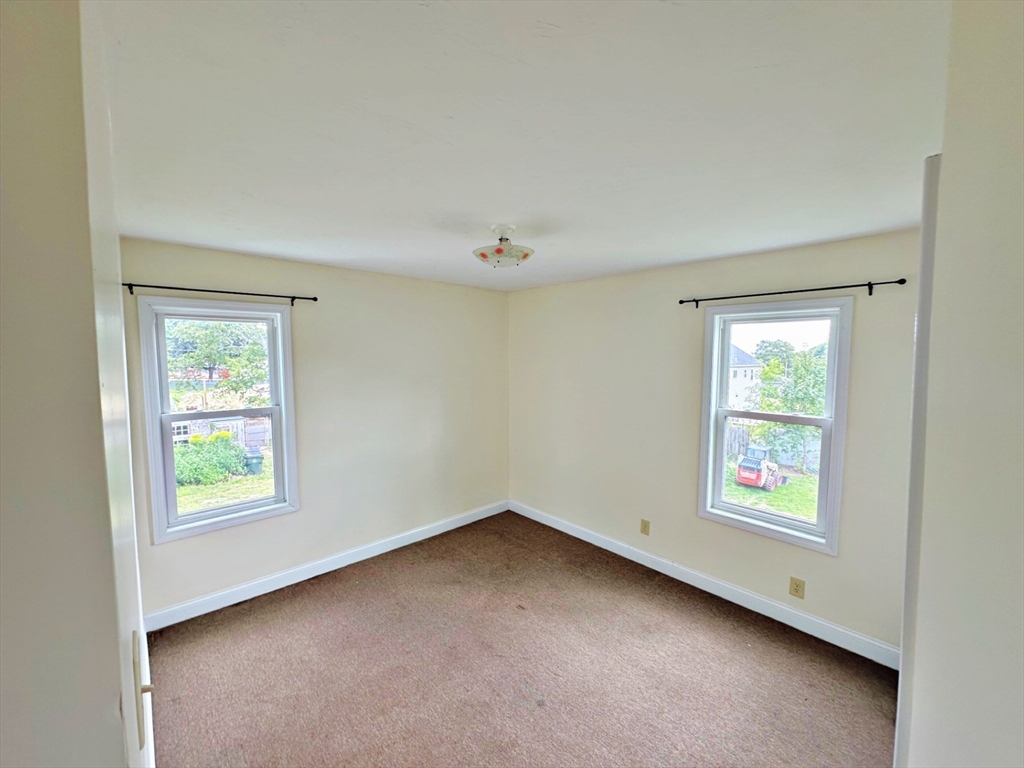 528 Lawton Street, Unit 2 Fall River, MA 02721 - Photo 12 of 20 an empty room with windows