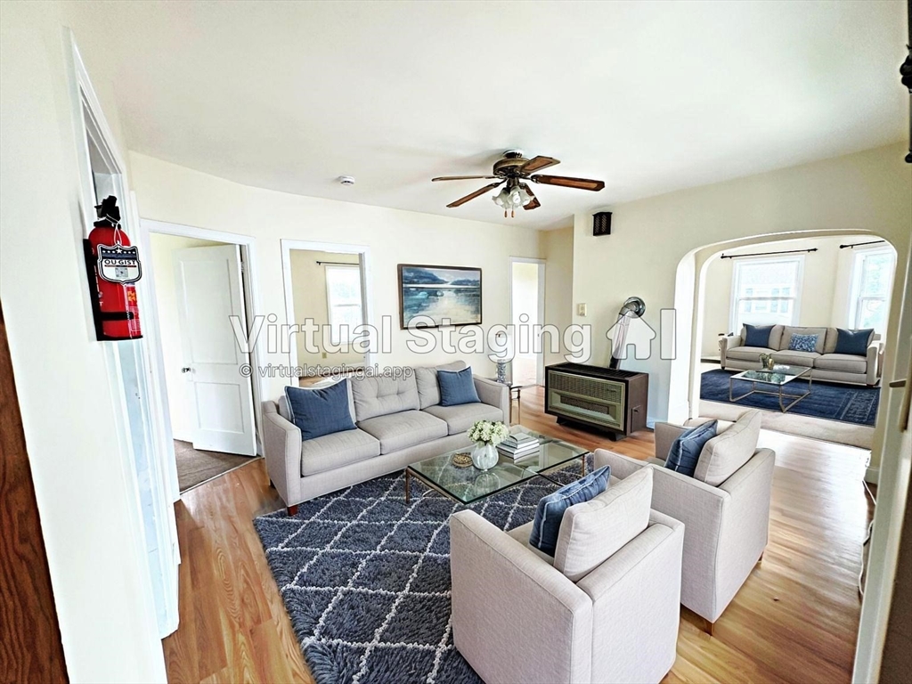 528 Lawton Street, Unit 2 Fall River, MA 02721 - Photo 4 of 20 a living room with furniture and a flat screen tv