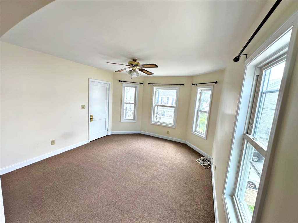528 Lawton Street, Unit 2 Fall River, MA 02721 - Photo 10 of 20 a view of an empty room with a window