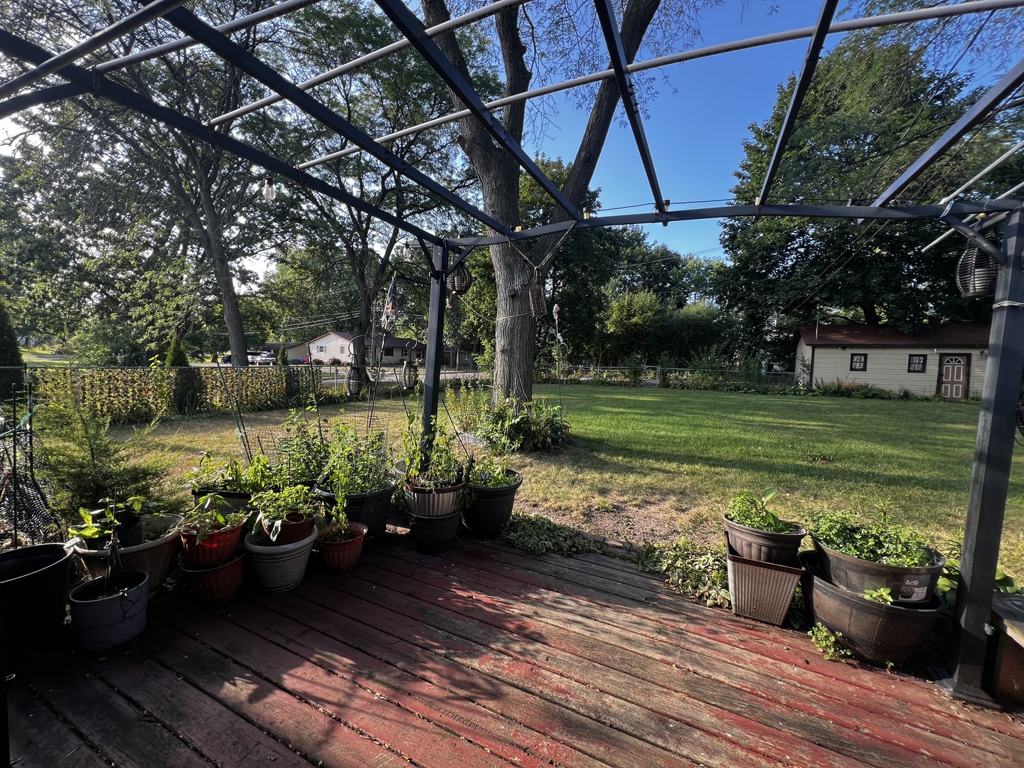 1930 23rd Street Zion, IL 60099 - Photo 17 of 18 a view of a couches in patio with a yard