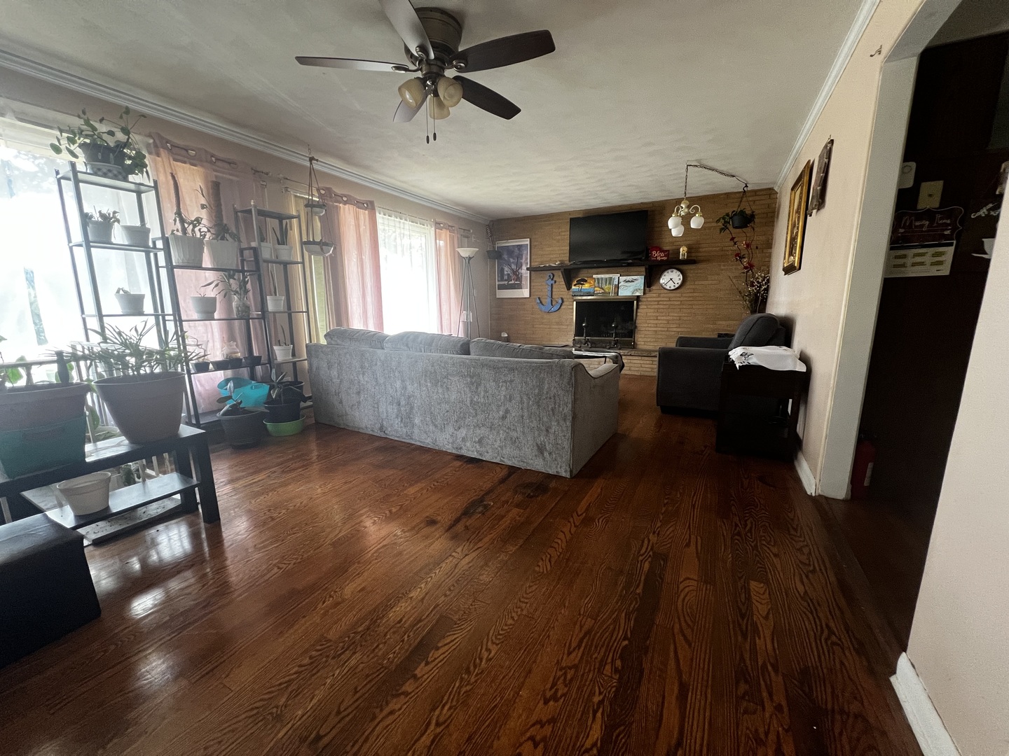 1930 23rd Street Zion, IL 60099 - Photo 4 of 18 a living room with furniture and a flat screen tv