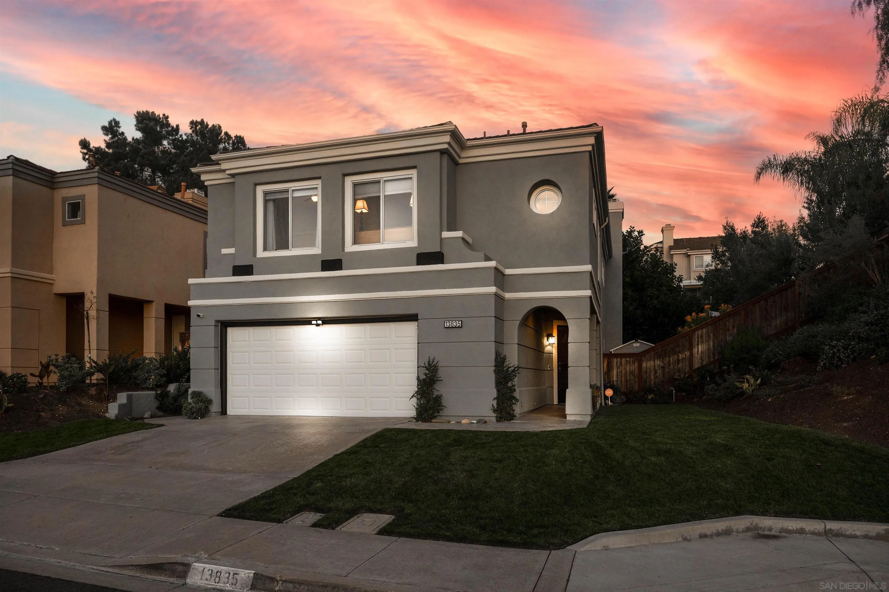 a house view with a garden space