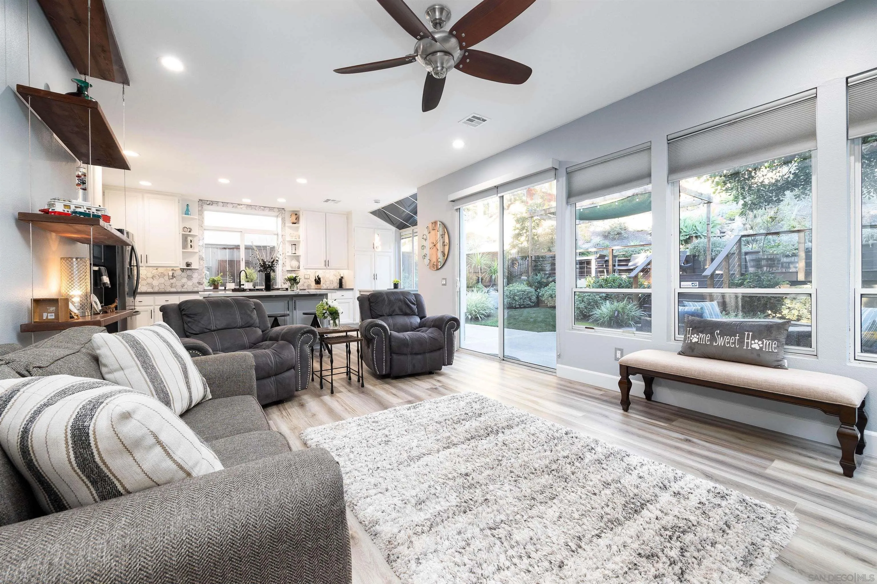 13835 Carmel Ridge Road San Diego, CA 92128 - Photo 13 of 38 a living room with furniture and a large window
